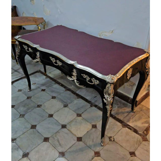 French Louis XV Writing Desk With Burgundy Top & Ornate Bronze Mounts & Silver Leaf For Sale In Miami - Image 6 of 6