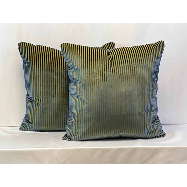 Custom-tailored handcrafted 20” pillows in royal blue velvet stripe on deep yellow/gold tone background. Hidden zipper...