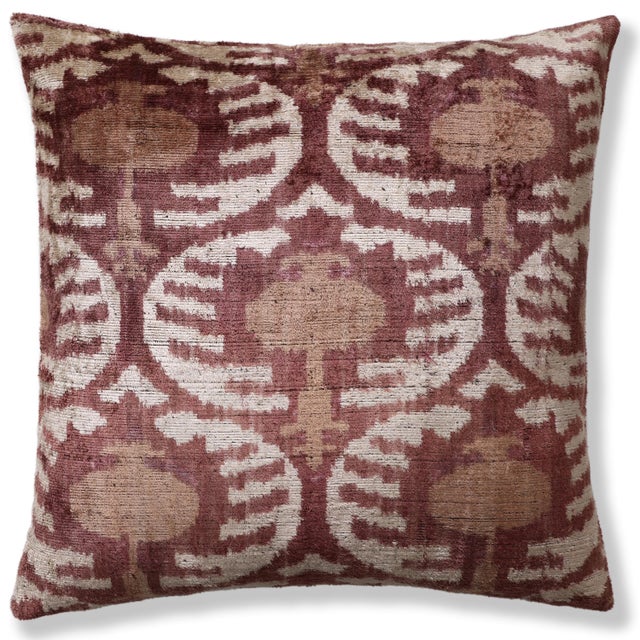 "This luxury 20x20 inch throw pillow is handwoven from authentic silk velvet and finished with a timeless ikat-inspired...