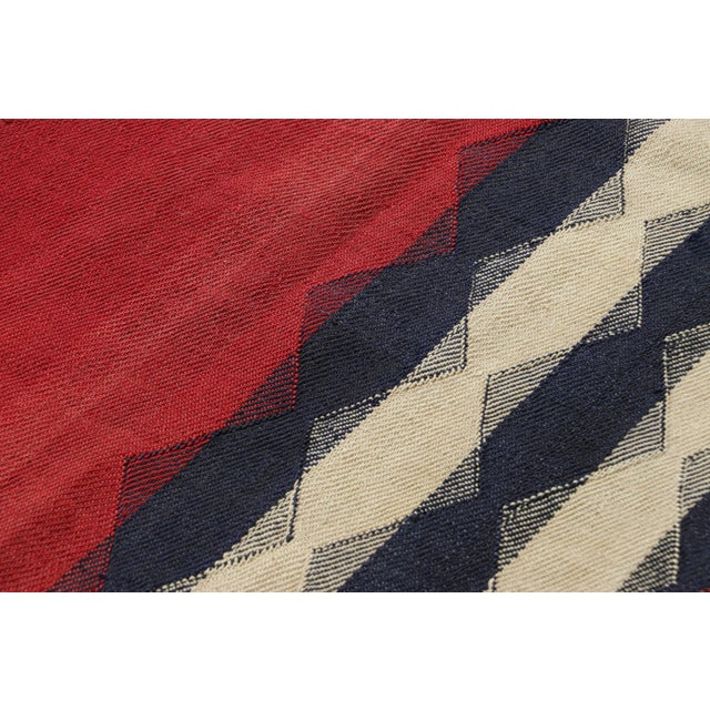 This vintage 5x7 Persian kilim is a mid-century Qashqai tribal rug, handwoven in wool circa 1950-1960. On the Design: The...