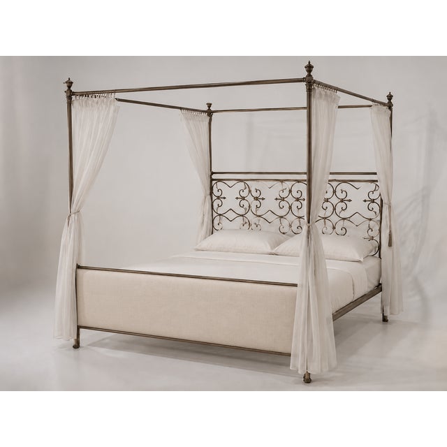 Tuscan style queen canopy bed. The bed has an upholstered inset on F.B. The bed has a unique finish and look. Finish is an...
