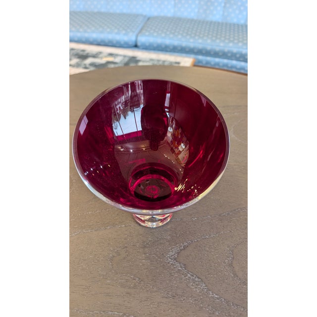 Sultry Amethyst Art Glass This elegant art glass vessel features a dramatic, asymmetrical "slanted" rim that gives the...