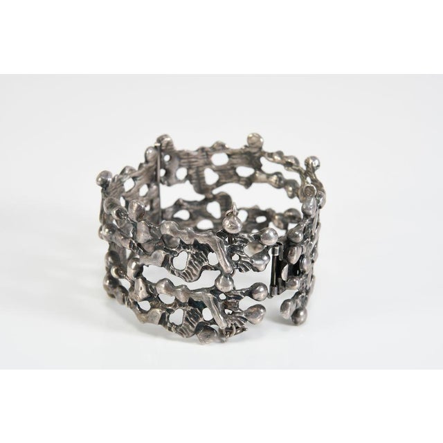 Sculptural statement bracelet from the Brutalist era (circa 1960s/1970s). This exceptional piece of jewelry was crafted...