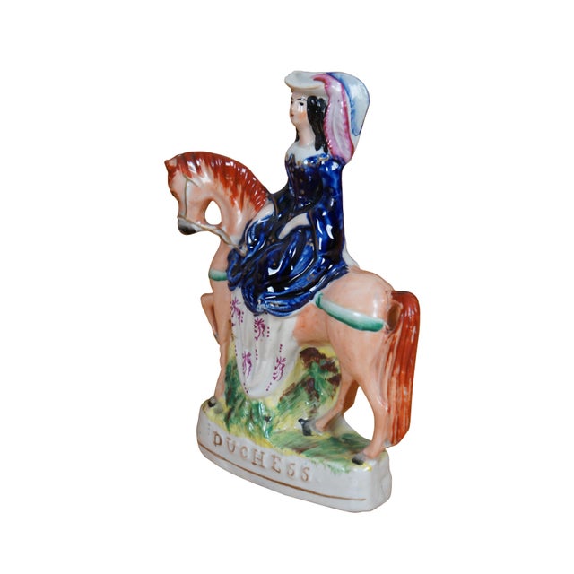 Antique 19th century Staffordshire porcelain equestrian flatback figurine titled on the base "Duchess," likely depicting...