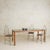 Its commanding presence, stretching just over six feet in length, articulates this Italian dining table from the 1970s....