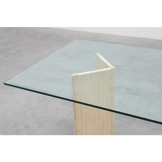 This refined mid‑century dining table from Italy, circa 1970, exemplifies the sculptural minimalism of postwar Italian...
