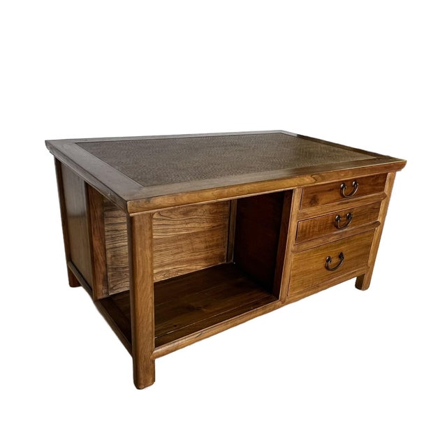 This was a prototype coffee table custom made with pieces of elm wood that were formerly temple beams salvaged from fallen...