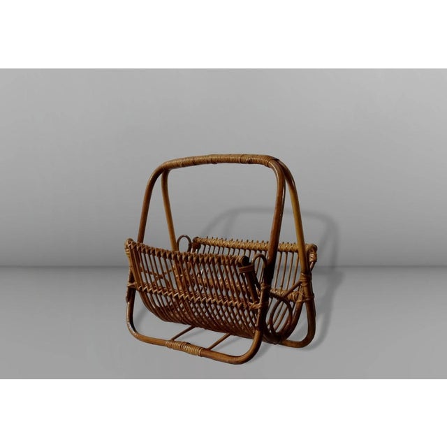 This charming bamboo and wicker magazine rack from the middle of the last century was designed and manufactured in Italy...