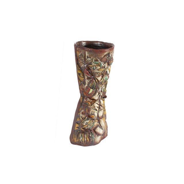 A 2012 studio pottery vase by the American artist Barry Unitas Barnes. The earthenware hand-built hourglass-shaped vase...