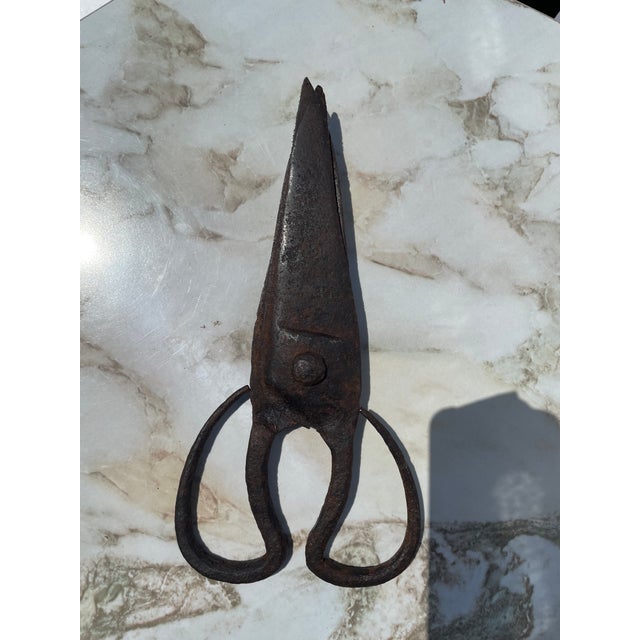 here we have an amazing pair of large authentic medieval 15th century iron shears/scissors with makers marks. Imagine all...