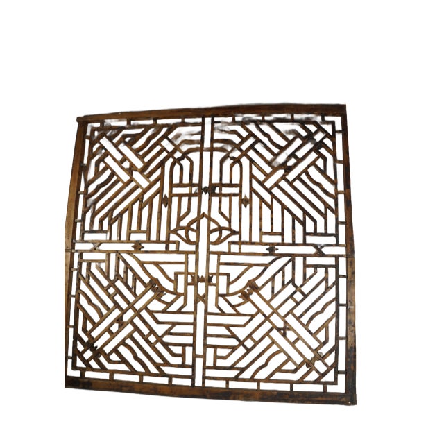 The large lattice transom window is uniquely Chinese. The wood-workers of China used the traditional joinery to put small...