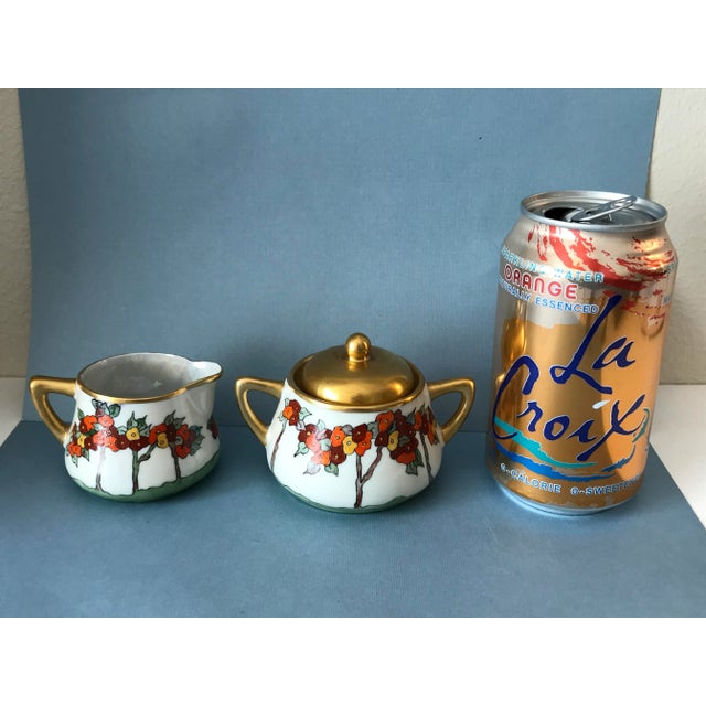 This 1930's Arts & Crafts Flowers Hand Painted By and Signed "Alpha Walker-Witt" Sugar + Creamer Set Meito China Blank is...