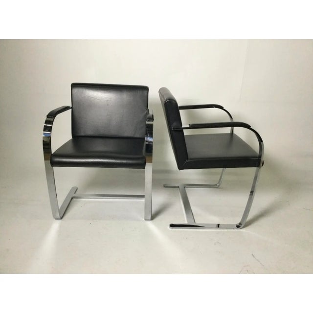 Pair Iconic Mies Van Der Rohe Brno Style Flat Bar Chair in Black Leather. Bought in the D & D building in NYC.. No...