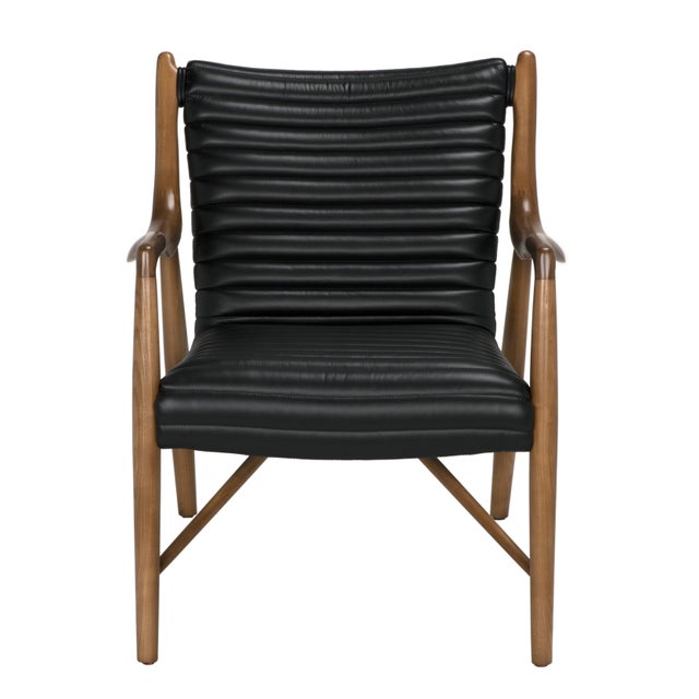 Upgrade your living space with the sophisticated Elton Chair. Made from rich walnut and top-grain leather, this chair...