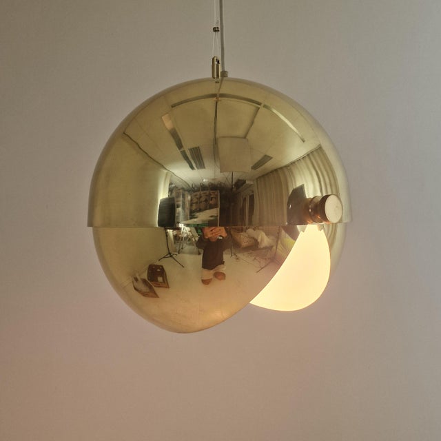 An exceptional and highly collectible mid-century modern German pendant light, attributed to the renowned Vereinigte...