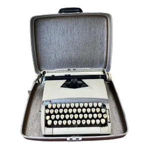 Sears Tower Constellation Portable Typewriter W/Metal Case. Circa 1960s.