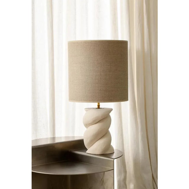 Babka Table Lamp by Di Fretto Dimensions: ⌀ 14 x H 53 cm (measure without lampshade) Materials: White Faience (not glazed)...