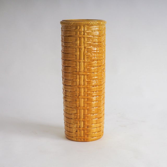 Striking XL vintage ceramic vase in a bright yellow colour and a woven like pattern. The vase can also be used as an...