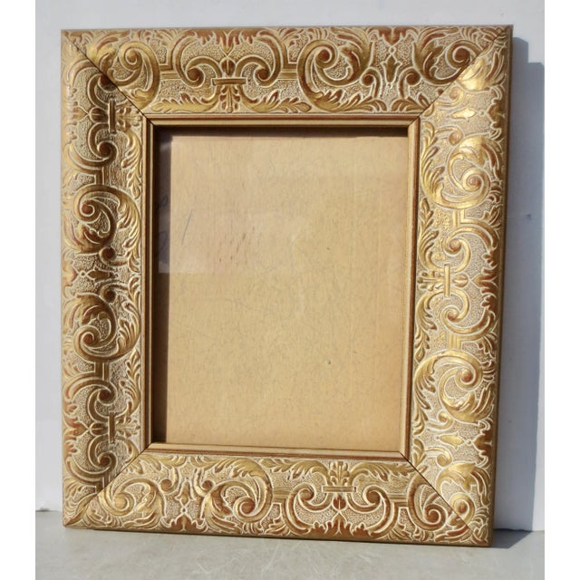 Neo-Italian designed portrait frame. Heavy solid wooden photo frame. Embossed wood molding with a gilt-rubbed pattern of...