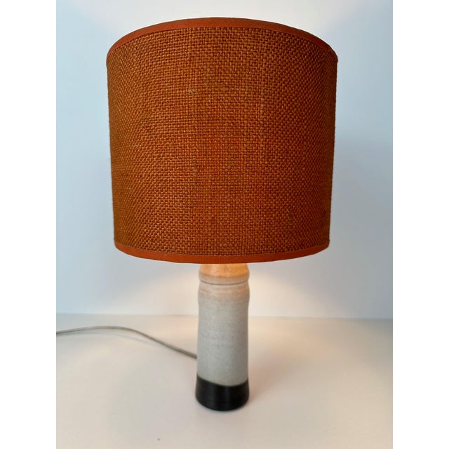 Vintage table lamp. Signed ceramic. No chips or cracks. Original fabric lampshade. E27 fitting. Height: 33cm. Diameter:...