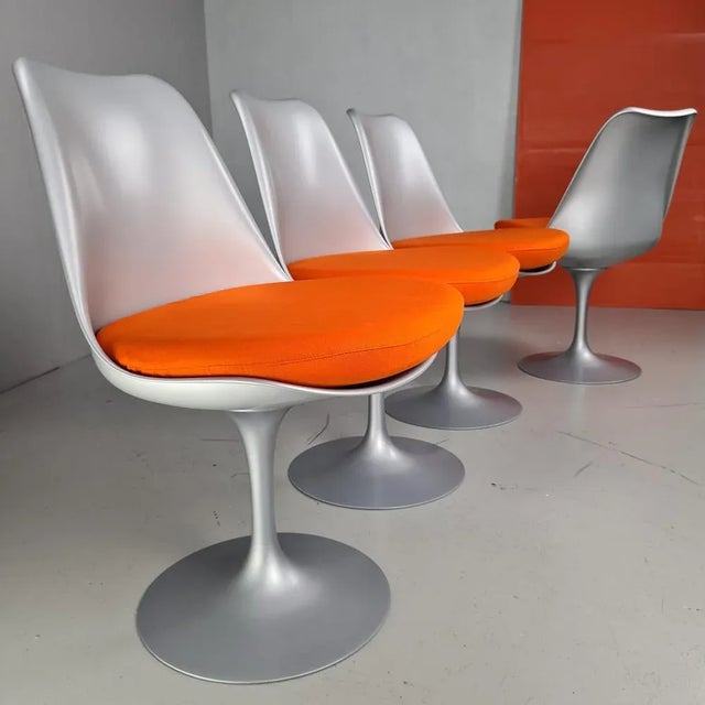 Gray Structure and Orange Cotton Pillow Tulip Chairs by Eero Saarinen for Knoll, Set of 4, in Flawless conditions....