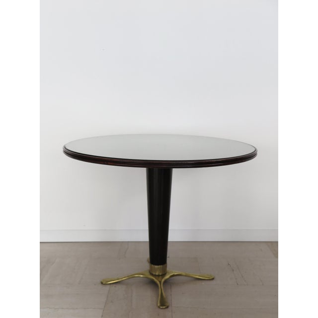 Italian midcentury modern design round dining table o gueridon designed by Paolo Buffa with wooden frame and top, into...