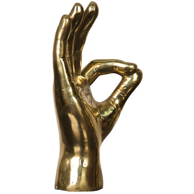 This fun brass sculpture is an unexpectedly chic way to convey that it's all going to be ok! Handcrafted and beautifully...