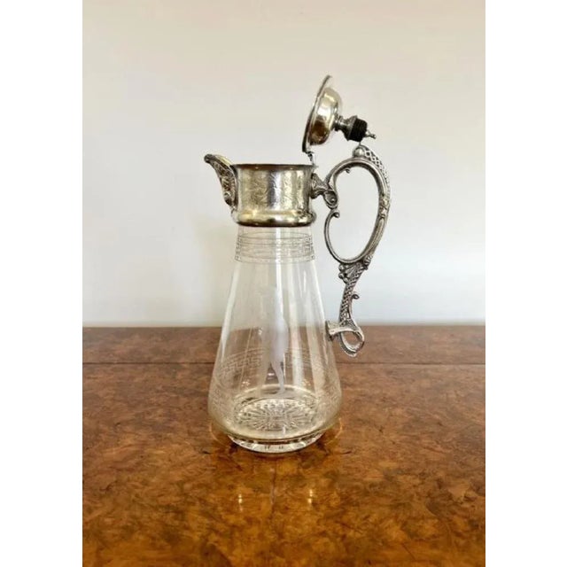 Superb quality antique Victorian glass and silver plated claret jug having a superb quality claret jug with a silver...