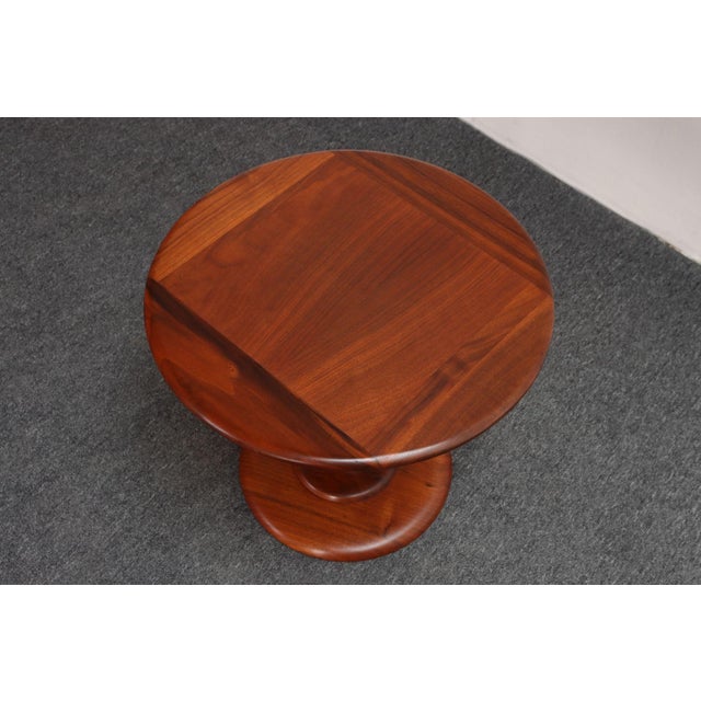 Elegant tulip-style solid staved wood side/end table with attractive walnut grain and rich color by Prodelco of Los...