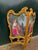 A refined 1960 Louis XVI-style two-panel room divider, handmade from carved solid beechwood with a rich antique gold...