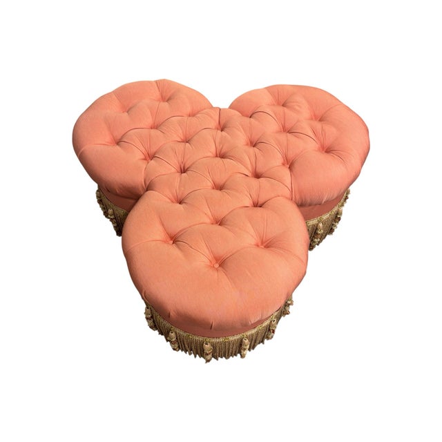 Edward Farrell hollywood regency style clover leaf form tufted ottoman with a pink cushioned and multicolored tassels.