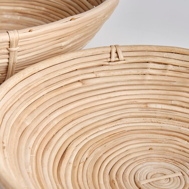 This oversized low bowl cane rattan set of two are stacked, not woven creating a more substantial basket. With a light and...