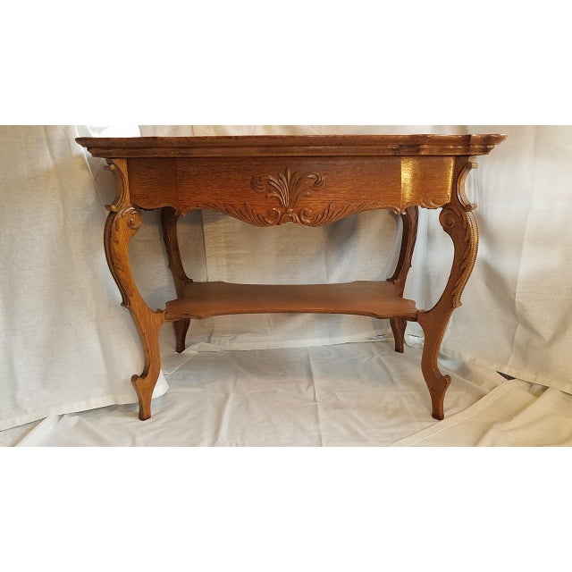 Victorian Golden Oak Fancy Library Table Circa 1890's This exquisite table has held a prominent place in our foyer for...