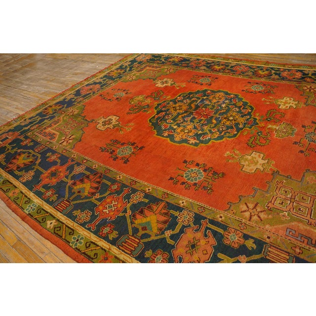 Decorative Turkish Antique Oushak Rug on a Red-Raspberry Background Color With Medallion Pattern For Sale - Image 9 of 12