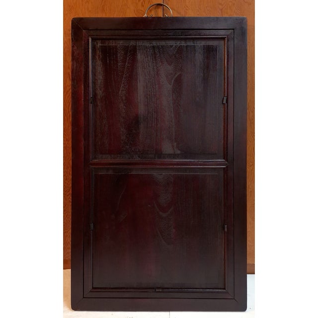 Chinese framed porcelain Buddhist temple plaque Kuan Yin with a lotus blossom, a finely drawn depiction of Kuan Yin, in...