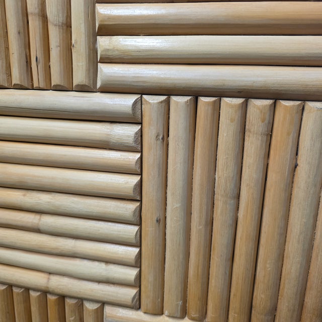 This Vintage Organic Modern Rattan & Bamboo Geometric Four-Panel Folding Screen, 1970s Coastal Chic is visually striking,...