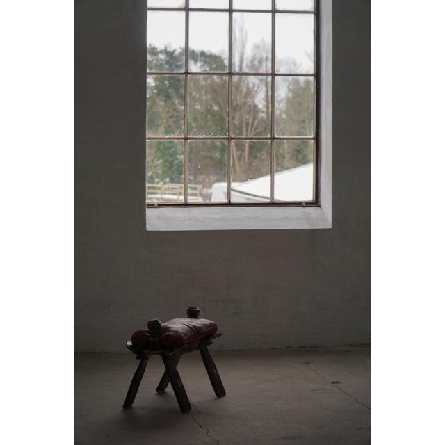 Moroccan Dark Red Upholstered Camel Saddle Ottoman, North Africa, 1940s For Sale - Image 4 of 17