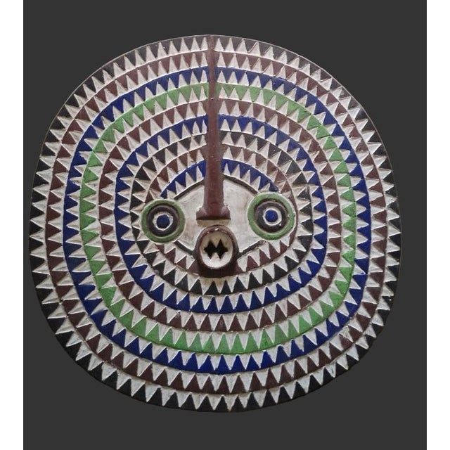 Large Bwa Sun Mask – Tribal Art from Burkina Faso Majestic hand-carved and hand-painted Bwa Sun Mask from Burkina Faso....