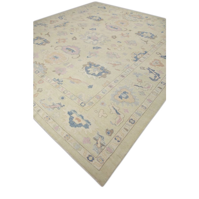 Elevate your home decor with the exquisite Handmade Modern Turkish Oushak Rug, measuring 12'2" x 13'4". This stunning...