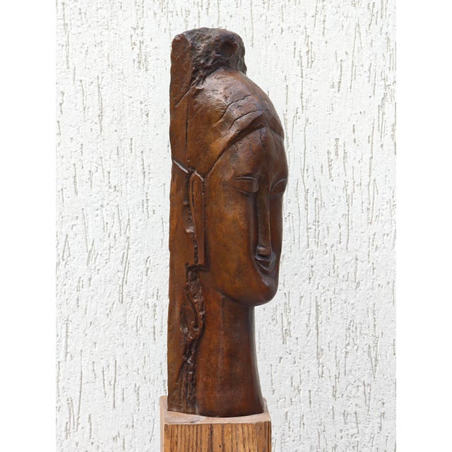 Artist: amedeo modigliani (after) artwork: tête de femme (head of a woman) year of ideation: 1912 (conceived as a stone...