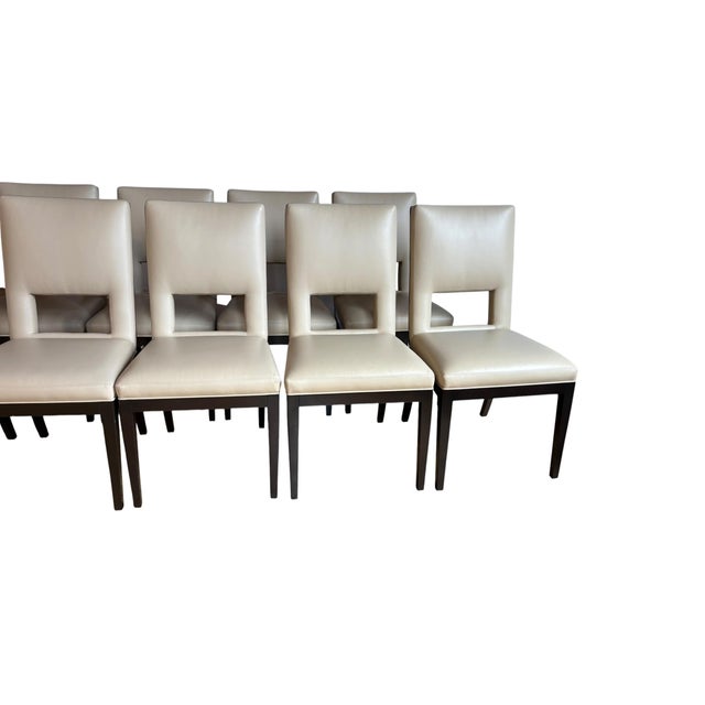 Sensational custom Liaigre style dining chairs from a Hamptons estate. The chairs feature buttery soft leather in ivory...