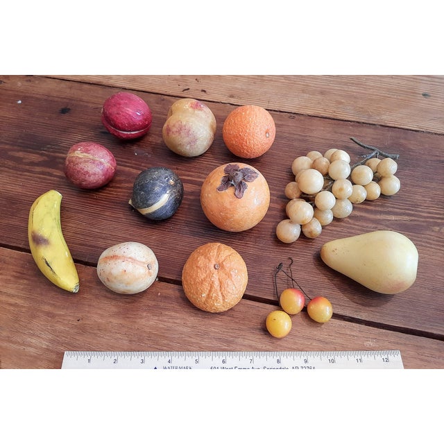 For sale is a remarkable, hard-to-find complete set of 12 stone fruit. This highly desirable rough-edge, unpolished...