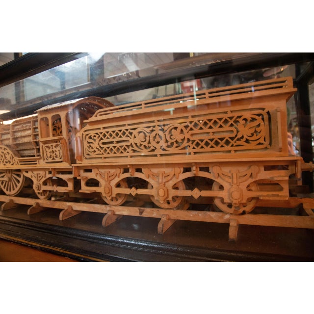Traditional Carved Wood Model of a Locomotive in Black Lacquered and Glass Case For Sale - Image 3 of 5