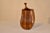 Sleek mid-century turned treen jar with lid. The jar is made from mahogany and walnut and is uniquely shaped. The wood has...
