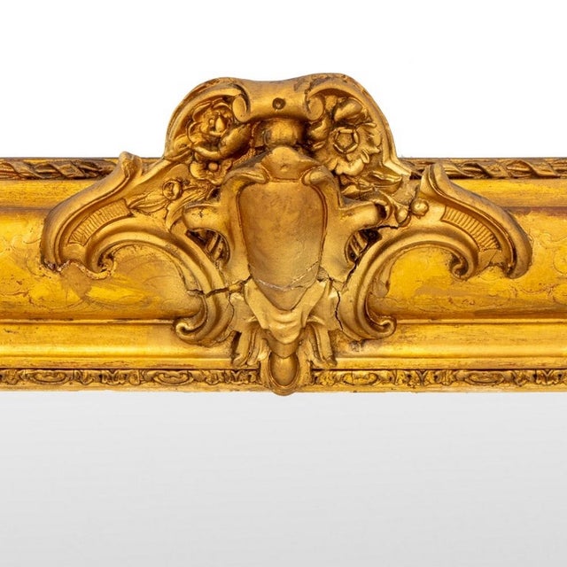 Louis Philippe Style Giltwood Mirror, with crest to top and bottom edge. 40.5" H x 46.5" W. Provenance: From a Manhattan...