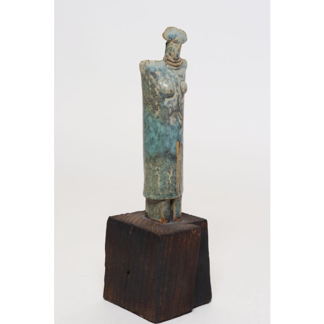 Abstract Etruscan-style female deity/idol tabletop effigy sculpture in terracotta mounted to a wooden plinth base (ca....
