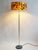 Very elegant 1960s mid- century brass floor lamp from Austria, in polished brass on a light grey circular metal base. The...