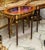 Showcase your treasured collectibles in timeless French elegance with this exquisite Louis XVI oval display side table....