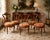 These show-stopping, elegant dining chairs are circa 1950s chairs in a refined Louis XV style, featuring intricate ormolu...