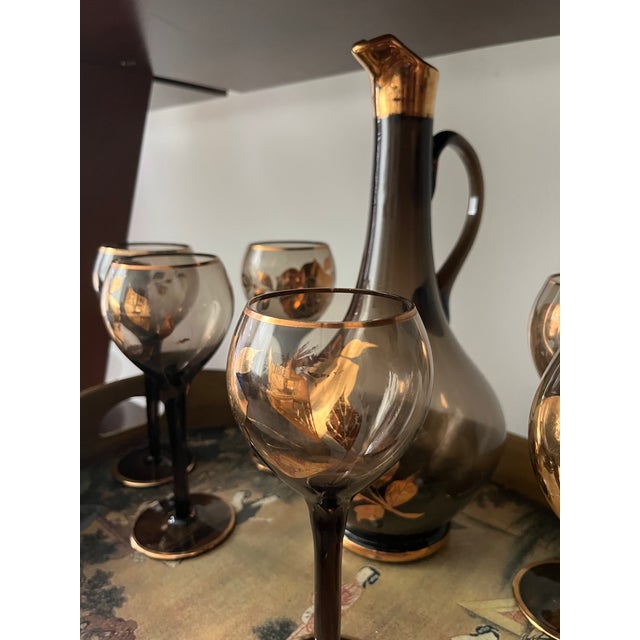 Stunning bohemian glass set from the 1960s, long stem with gold rims. No chips! The tray is not available; it is for...